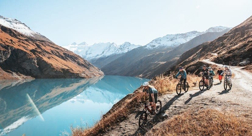 Riding along the crystalline waters of the Moiry Reservoir