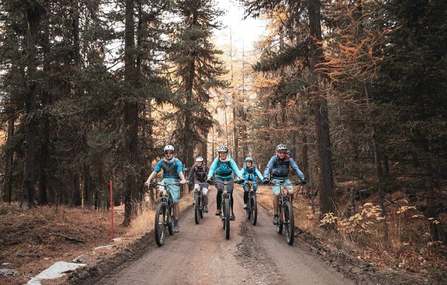 Riding through ancient larsh forest on the Family & Friends Haute Route