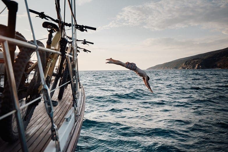 Going for a plunge off Elba Island's coast after an epic day on the e-MTB