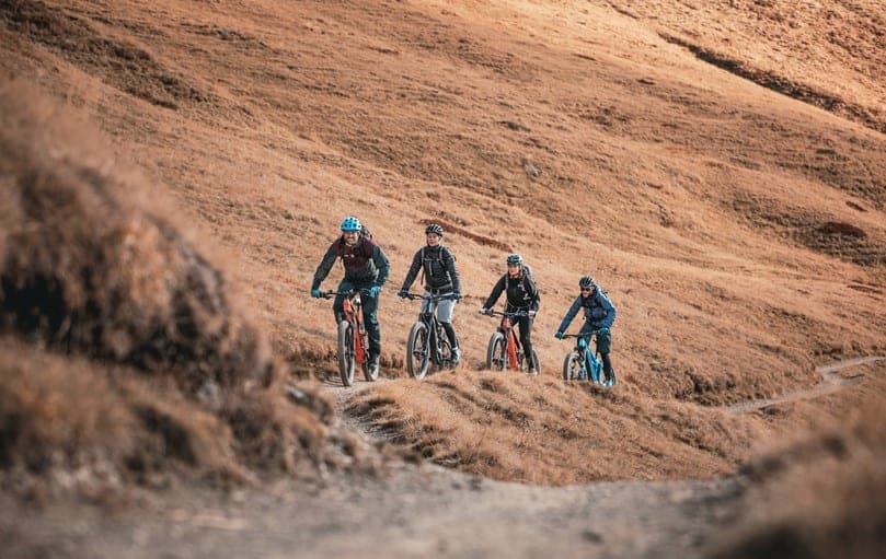 Riders on an alpine trail on the Haute Route